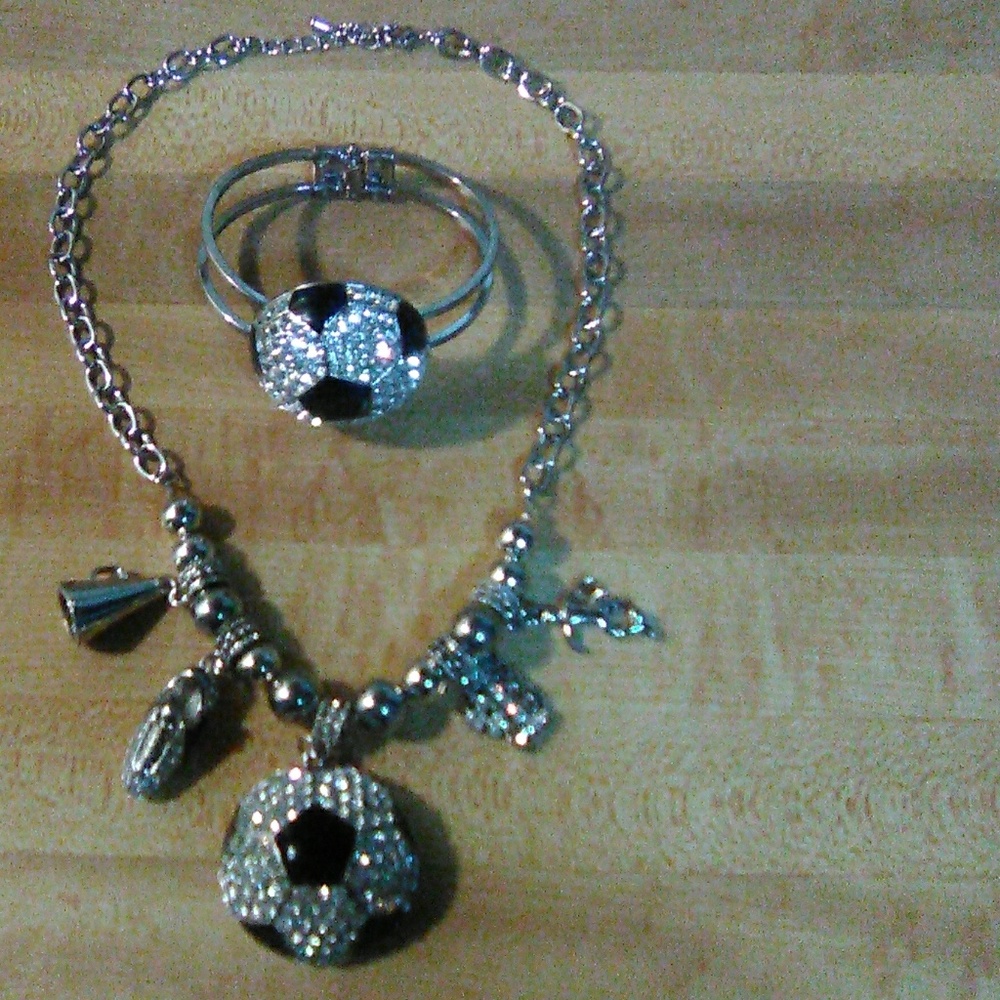 A soccer diamond necklace and bracelet set